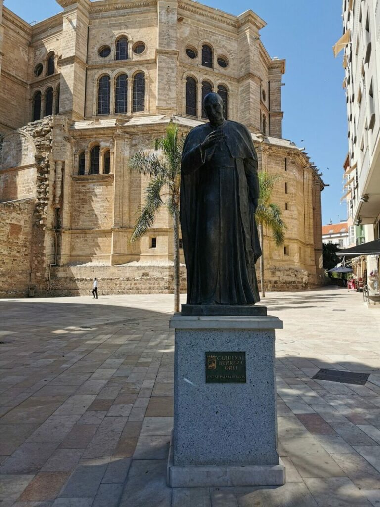 A statue of Cardenal Ángel Herrera Oria outside of the cathedral in Malaga Spain