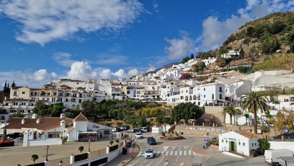 A view of the white houses of Frigiliana rising up into the mountain.