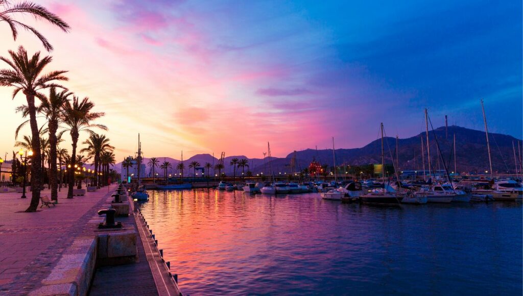Boats on the water at sunset in Cartagena Murcia